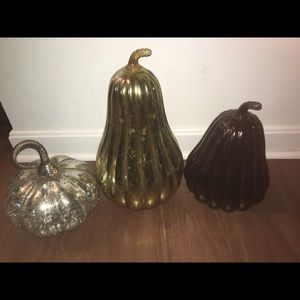 Three glass pumpkins.